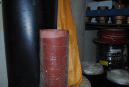 Sirco Industrial warehouse at 2127 Caughey Road in Erie, PA holds rolls of various sizes and types of sheet rubber as shown.