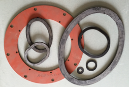 Several sizes and shapes of gaskets are shown in a pile on Sirco Industrial’s customer service counter.