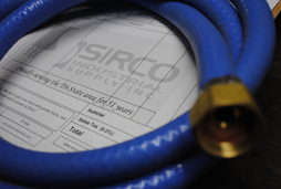 Sirco Industrial Supply customized hose with brass fittings is made to order for a local manufacturing company.